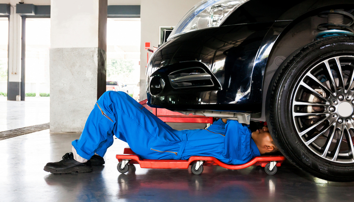 mechanic fixing car